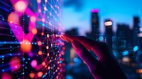 Silhouetted hand touching digital interface with glowing data visualization against blurred cityscape background with neon pink and blue bokeh lights at night.