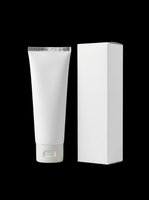 White cosmetic tube with ribbed cap and matching rectangular box, isolated on transparent background. Ready for skincare, beauty, and personal care product mockups, packaging design, e-commerce, print-on-demand, and branding applications.