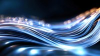 Glowing blue waves with luminous light effects on dark background create dynamic flowing motion pattern with smooth curved lines and bokeh elements.