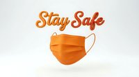 Orange medical face mask with Stay Safe text on white background, promoting health protection and safety awareness during pandemic.
