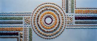 Decorative rope and cord collection arranged in geometric patterns on light blue background. Various textures and colors for crafting and design projects.