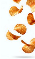 Crispy potato chips falling on white background, isolated food elements with natural shadows for snack and restaurant menu design projects.