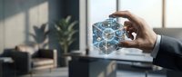 Close-up of businessman hand holding glowing digital cube with network connections in modern office environment for technology and innovation concepts.