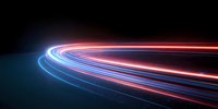 Glowing red and blue light trails curve along dark background creating dynamic motion effect, suitable for technology and speed concepts in advertising designs.