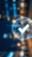 Digital checkmark symbol with glowing circular interface and light effects on blurred technology background for business verification concepts.