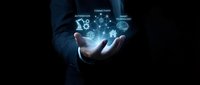 Businessman in dark suit holding glowing digital network icons representing global connectivity, communication, and technology solutions for business and corporate applications.