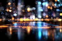 Glowing abstract city lights reflected in water with blurred bokeh effect creating magical nighttime urban atmosphere. Colorful defocused background.