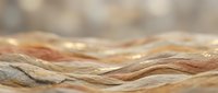 Layered sedimentary rock formation with natural striations and geological patterns showcasing earth's history through colorful mineral deposits and erosion.
