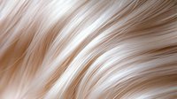 Soft flowing beige and white abstract waves create gentle curved lines and smooth gradients in elegant minimalist composition. Suitable for luxury beauty backgrounds.