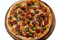 Spicy pepperoni pizza with jalapenos and red onions on wooden board, melted cheese and tomato sauce. Perfect for restaurant menu, food delivery advertising or culinary blog.