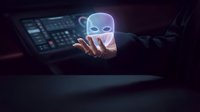 Hacker in dark hoodie holding glowing neon mask over laptop with code interface, representing cybercrime, digital security threats, and illegal hacking activities in cyberspace.