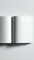 Open blank notebook with white pages and visible spine, isolated on neutral background, ready for design mockups, branding, and publishing projects.