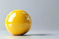 Glossy yellow sphere on light gray background casting soft shadow. Minimalist composition with clean lines and simple geometry for modern design projects.