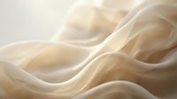 Smooth flowing waves of cream-colored fabric create an elegant abstract composition with soft lighting and gentle shadows, suitable for backgrounds and design projects.
