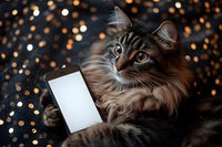 Fluffy Maine Coon cat holding smartphone with blank screen against bokeh background, concept for pet technology and social media.