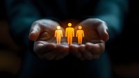 Glowing human figures held in caring hands against dark background, symbolizing support, leadership, community care, and human resources management.