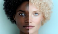 Split portrait showing contrasting facial features of African and Caucasian women merged into one face, highlighting diversity and unity in human appearance.