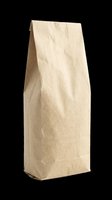 Blank kraft paper bag isolated on transparent background, ready for packaging design, branding mockups, print-on-demand products, and commercial use applications.