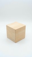 Wooden cube with natural pine finish isolated on white background, ready for product design, packaging mockups, and craft projects.