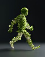 Running figure made of green leaves and branches on dark background, representing eco-friendly lifestyle and sustainable movement concept.