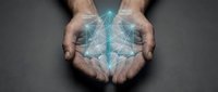 Male hands holding glowing geometric holographic symbol representing technology, innovation, and digital transformation for business and corporate concepts.