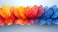 Colorful gradient feathers arranged in row from warm orange to cool blue tones creating decorative border pattern on light background. Artistic composition.