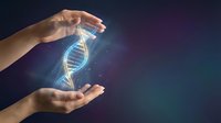 Hand holding glowing DNA helix with blue light particles on dark background, representing genetic research, biotechnology, and scientific innovation in medicine.