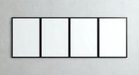 Four blank white canvas frames in black borders hanging on gray wall for mockup gallery exhibition space interior design presentation.