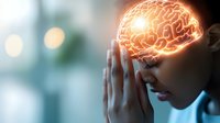 Young Asian woman with glowing brain visualization praying or meditating, representing mental health, mindfulness, and cognitive function in healthcare concept.