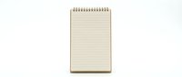 Blank spiral notepad with lined pages isolated on white background for writing notes, sketches, and creative projects.