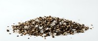 Pile of crushed black pepper corns and spices on white background, isolated culinary ingredient for cooking and seasoning applications.