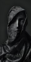 Faceless figure wrapped in textured fabric with dramatic lighting, conveying mystery and anonymity. Suitable for concepts of identity, privacy, and abstract portraiture.