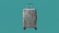 Worn gray hard-shell suitcase with spinner wheels isolated on teal background, showing travel wear and scratches for luggage and journey concepts.