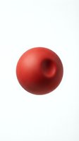Red sphere with circular indentation isolated on white background for modern design projects and geometric compositions.