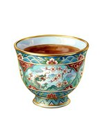 Ornate porcelain teacup with turquoise, gold, and red decorative patterns featuring floral and bird motifs, isolated on white background for design use.