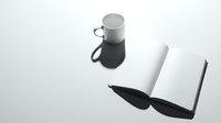 Overhead view of open notebook with black feather quill pen and gray ceramic mug with handle on white surface, minimalist monochrome flat lay composition for creative writing, journaling, and office workspace design projects.