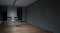 Modern minimalist interior with dark gray walls, wooden flooring, and contemporary furniture in empty gallery or studio space for design and architecture projects.