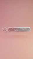 Minimalist search bar with magnifying glass icon on soft pink gradient background for web design and user interface applications.