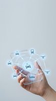 Hand holding transparent smartphone displaying connected vehicle network with car, train, bus, and drone icons linked by glowing lines, representing smart transportation and IoT technology for automotive apps.