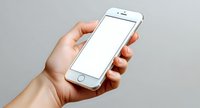 Hand holding white smartphone with blank screen against light gray background, mockup for app and website presentation, isolated mobile device display.