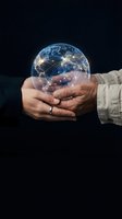Hands holding glowing digital earth globe with network connections representing global communication technology and worldwide connectivity concepts.