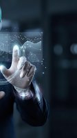 Businessman hand touching futuristic holographic interface with data analytics charts and network connections on dark blue background.