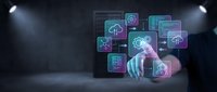 Business professional interacting with holographic cloud computing interface displaying data analytics, AI and digital transformation icons in futuristic workspace.