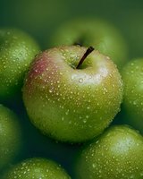 Fresh green apple with water droplets on smooth skin, macro view showing natural texture and dewdrops against dark background. Suitable for healthy lifestyle content.