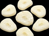 Sliced garlic cloves isolated on transparent background, ready for culinary design, cooking graphics, recipe illustrations, food packaging, restaurant menus, and kitchen-themed print-on-demand products.