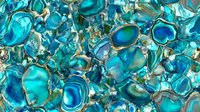 Stunning turquoise and blue gemstone pattern with metallic accents creates luxurious abstract background for jewelry design and premium branding projects.