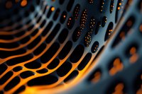 Abstract macro photography of glowing orange and blue curved lines with perforated pattern creating futuristic technological background effect.