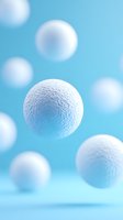 White textured spheres floating in blue space with soft focus background, creating minimalist composition for science and technology concepts.