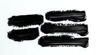 Black brush strokes with textured edges and varied lengths create dynamic paint marks on white background, isolated design element for artistic projects and branding.