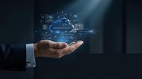Hand of a businessman holding a glowing cloud technology hologram with digital network icons on dark background, symbolizing innovation.